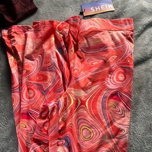 Abstract orange flare pants